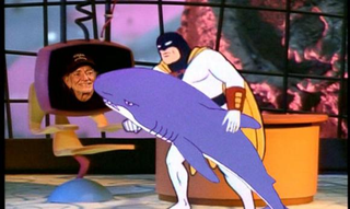 Space Ghost introduces Willie Nelson to a shark